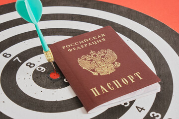 passport of a citizen of the russian federation and a dart on a darts board