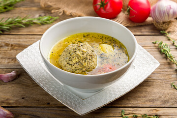 Kufta bozbash soup on white bowl on old wooden table
