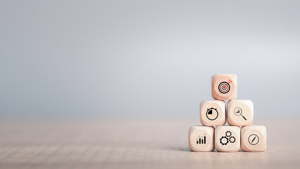 Wooden cube step on table with icon Action plan, Goal and target, success and business target...