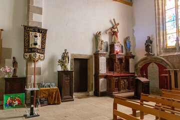 Ploumilliau (Plouilio), France. Monument to First and Second World War fallen inside the Eglise Saint-Milliau (St Miliau Church)