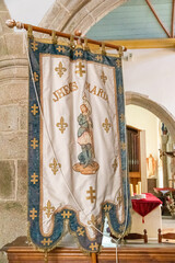 Ploumilliau (Plouilio), France. Representation of Joan of Arc (Jeanne d'Arc) inside the Eglise Saint-Milliau (St Miliau Church)