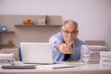 Old male boss working from home during pandemic