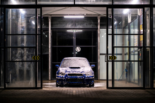 Blue Car In The Auto Washing Box In The Night