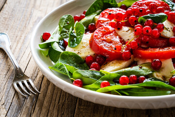 Mozzarella salad on wooden table
