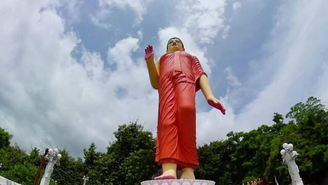 The world's tallest walking Buddha statue - Ranawana Purana Rajamaha Viharaya, Kandy, Sri Lanka.