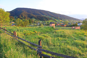 Landscape with Carpathian Mountains in sunset time in Verkhovyna, Ukraine	
