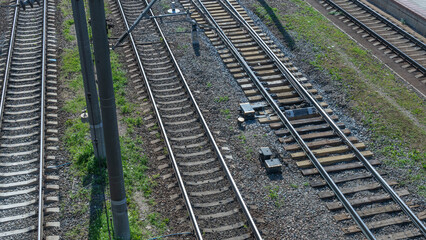 Top perspective view on many railway track lines. Railway, railroad track. Cargo and journey concepts.