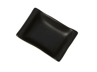 Black empty ceramic dip bowl close up. Isolated over white background