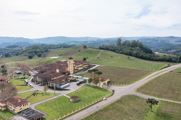 Small wine-producing farms in the region known as Vale dos Vinhedos in Bento Gonçalves, RS, Brazil, seen from a drone