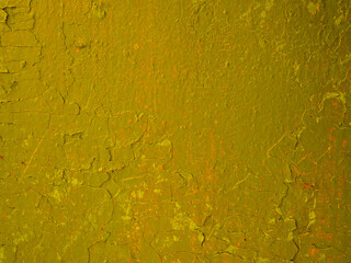 Abstract texture of shabby peeling red-brown paint on the wall.