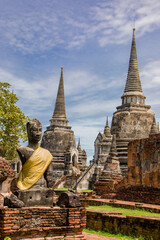 The Prang and Buddha statue in Wat Phra Si Sanphet, which means "Temple of the Holy, Splendid Omniscient",  was the holiest temple in Ayutthaya Thailand. 