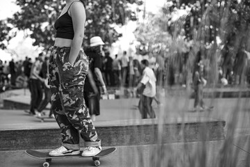 Skateboarding girl at skate park.