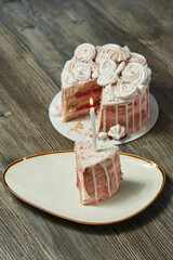 a piece of birthday cake with a candle. birthday cake