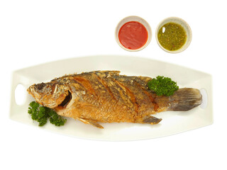 Fried fish with seafood sauce Isolated on white background.