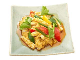 Stir fried seafood with curry powder Thai food Isolated on white background.