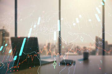 Double exposure of abstract creative financial chart with world map and modern desktop with laptop on background, research and strategy concept