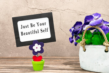 Inspirational quote on a paper frame - Just be your beautiful self
