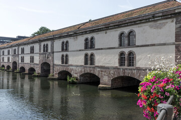Fototapeta na wymiar Medieval overbuilt bridge in Strasbourg. Alsace. France. Europe