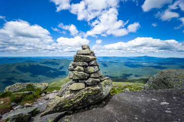 Fototapeta na wymiar Cairn on top of Algonquin Peak in Adirondack mountains
