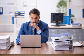 Young businessman employee working in the office