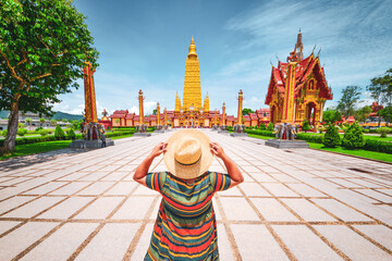 tourists feel Amazing big beautiful temple in Thailand. Amazing concept of Thailand. Wat Bang Tong,...