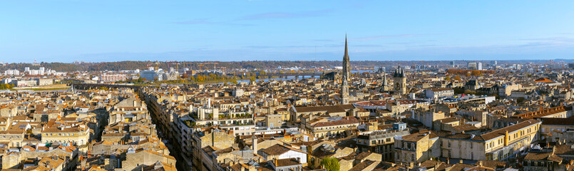 Stunning panoramic aerial cityscape from Pey Berland tower of St. Andrew's Cathedral beautiful sunny evening of warm golden autumn, Bordeaux, Gironde, Nouvelle-Aquitaine, France.