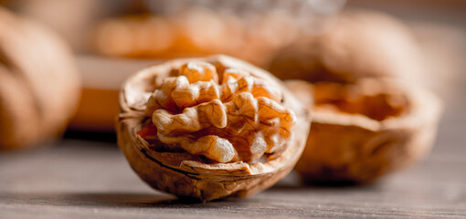 Healthy bio walnuts  on wood desk with detail background,  walnut on wood kitchen underlay.