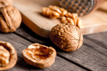 Walnuts kernels on wood desk with detail background,  walnut on wood kitchen underlay.