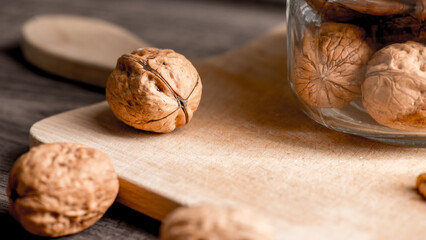 Walnuts kernels on wood desk with detail background,  walnut on wood kitchen underlay.