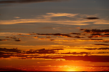Beautiful sunset clouds with orange and blue colors