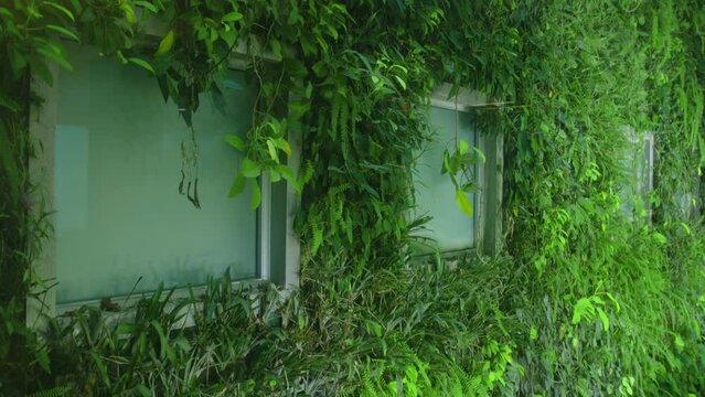 Modern and ecologic skyscrapers with many trees on every balcony. Bosco Verticale