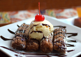 churros with cream and chocolate
