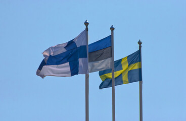 Flags of Finland, Estonia and Sweden together. Nordic countries. Finnish, Estonian, Swedish people together. 