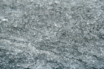 Asphalt mixed stone surface, rock layer of asphalt road.                            