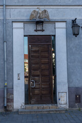 old wooden door in a wall. Poland.