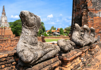Fototapeta na wymiar buddhist statue ruins in Wat Chai Watthanaram