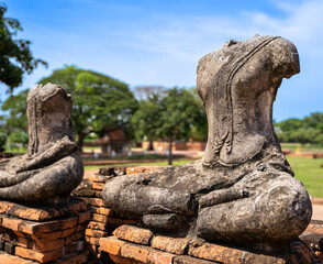 Fototapeta na wymiar buddhist statue ruins in Wat Chai Watthanaram