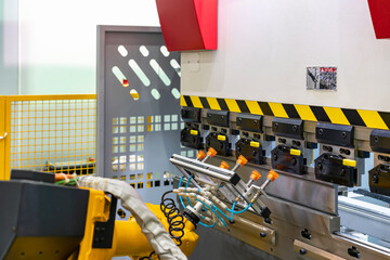 automatic vacuum pad or suction cup set on robot arm for pick material flat sheet for folding by hydraulic bending machine in manufacturing forming metal sheet