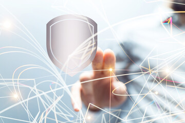 shield protection concept holding in hand