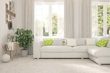 White living room with sofa and summer landscape in window. Scandinavian interior design. 3D illustration