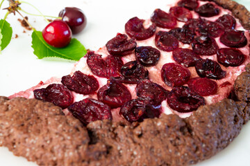 Chocolate biscuit with cherries. Shortbread chocolate dough pie with cottage cheese filling with cherries. cottage cheese pie with cherries