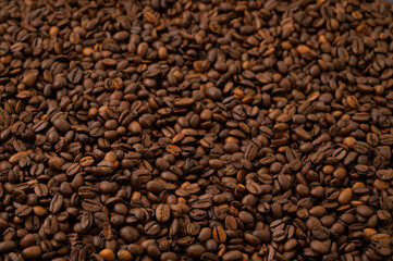 Roasted brown coffee beans background.