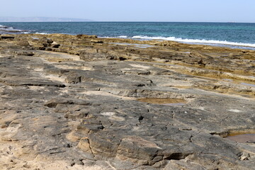 Rocky shore of the Mediterranean Sea in northern Israel.