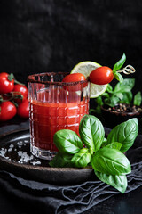 Drink Bloody Mary with peppers and tomatoes