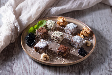 Concept: healthy food. Homemade healthy handmade sweets in a plate on the table.