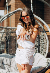Bachelorette party. A potential bride poses, showing off her wedding ring