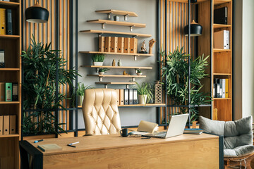 Obraz na płótnie Canvas Modern office of general manager, businessman, ceo. Stylish wooden table, leather chair, interior. Workplace, workspace of accountant, financial director. Shelves with documents. Home library