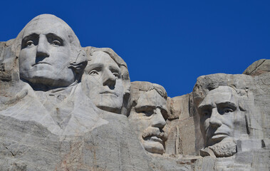 Obraz premium Close-Up of Four Presidents' Sculptures at Mount Rushmore National Park, South Dakota