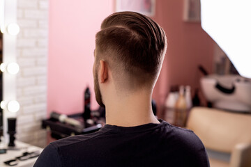 Male head with stylish haircut on barbershop background - obrazy, fototapety, plakaty