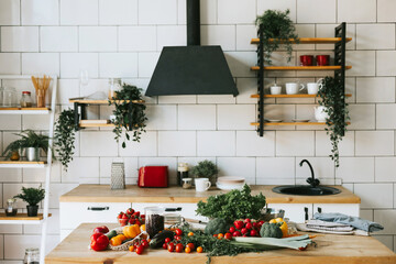 summer food fresh vegetables for salad on wooden table, peppers, tomatoes, cucumbers, broccoli and greens in cozy kitchen apartment